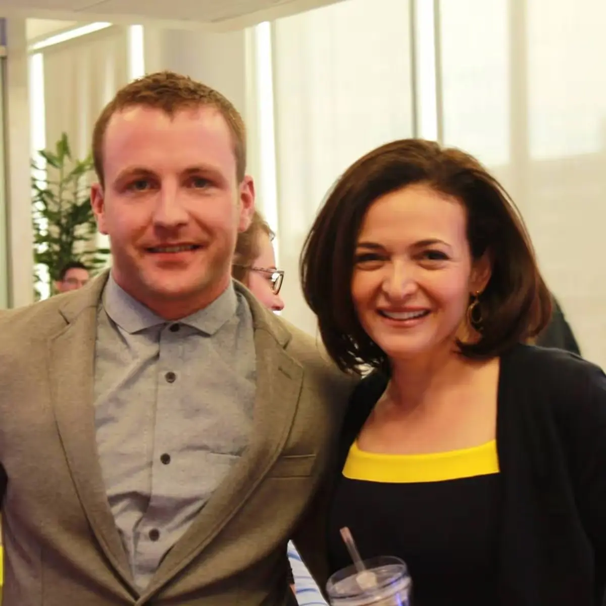 Pat smiling with Sheryl Sandberg at a Facebook event